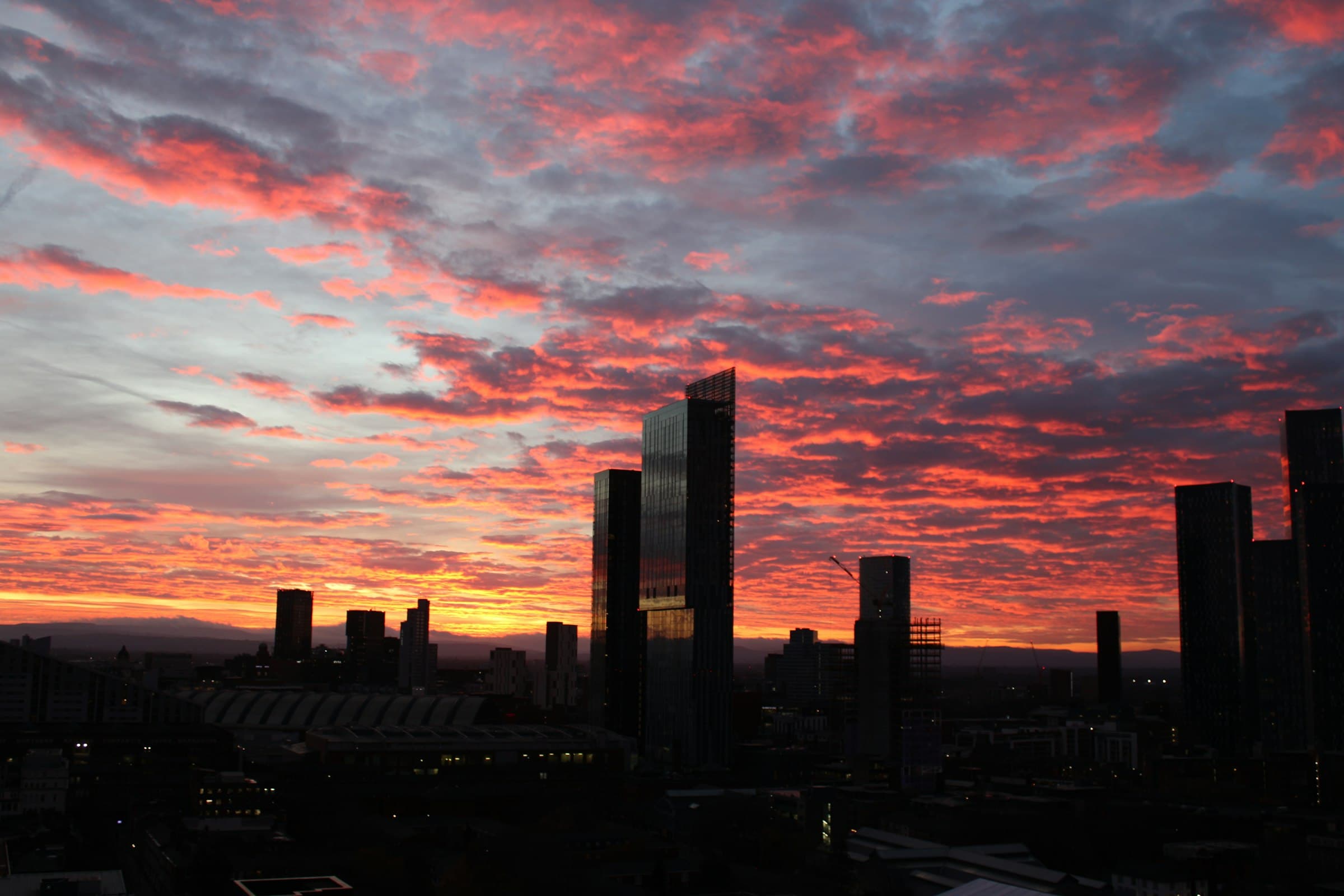 Manchester city skyline at sunset