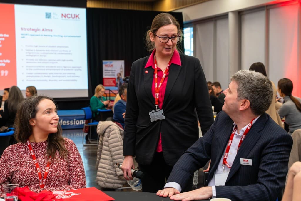 NCUK colleagues speaking with partners